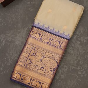 champagne gold silk saree with royal blue zari border